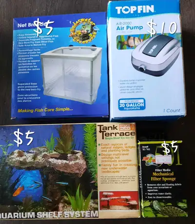 I'm selling a variety of used fish tank accessories. Available are a net breeder, Top Fin air pump (...