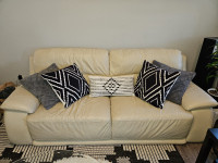Two white leather couch set