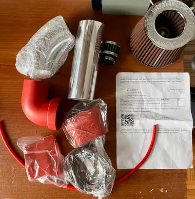 I am selling a new Air Racing High Performance all red coated cold air intake kit for 93-98 Volkswag...