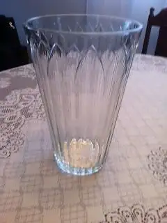 Large clear glass vase with nice cut glass design near top