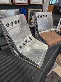 Custom built alum bomber bucket seats.