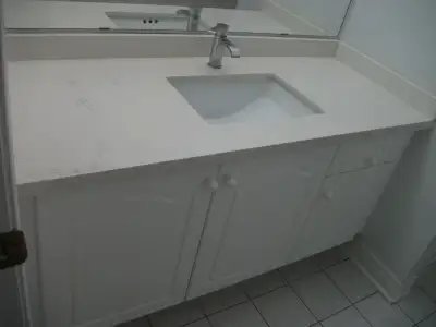 Washroom vanity features a cabinet that is 52 inches wide, a cou, View more