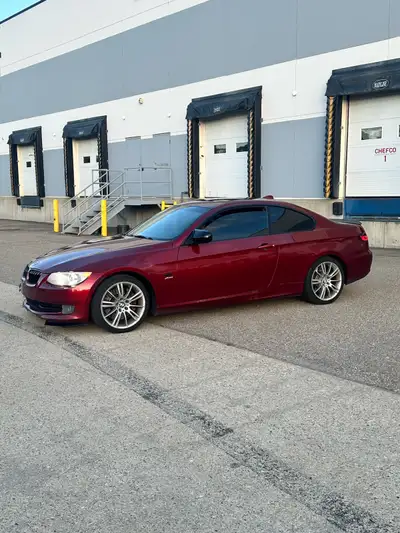 2011 BMW 335I. X drive rare vermillion red, only 3 others in Calgary. One of the most mechanically c...
