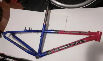 2004 Kona Fire Mountain frame, 14" size. 7005 alloy. Some paint scratches but no damage. Includes se...