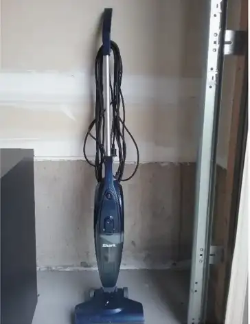 Shark upright vacuum cleaner. Blue color. Used - good condition.
