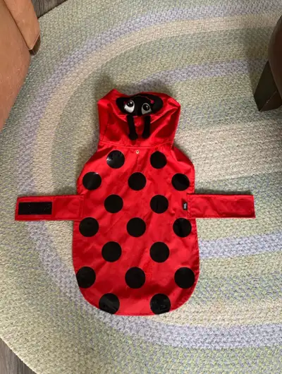 Silver Paw Dog Ladybug Raincoat 19” Keep your furry friend dry and stylish with this adorable Silver...