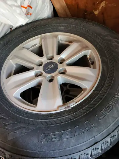 Selling a set of 4 Nokian winter Tires and stock Ford F150 rims Rims are from a 2018 Ford F150 6x135...