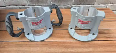 Brand new Milwaukee 5625 router bases. Use either handheld or in router table. One has handles the o...