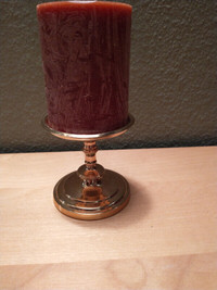 Solid brass pillar candle holder.