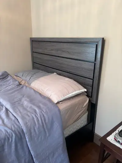 Selling Queen size bed frame (no mattress or box spring) bed frame brand new purchased 3 months ago...