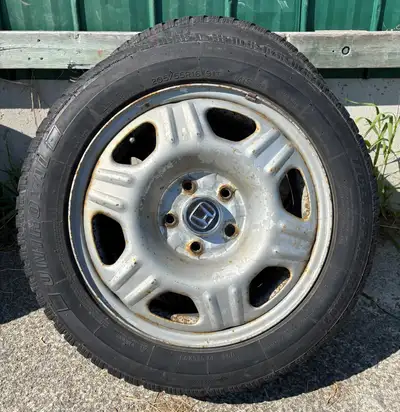 Four 16” steel Honda wheels with 205/55R16 Uniroyal snow tires. They were used on 2007 Civic. Cash o...