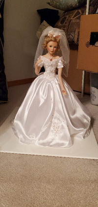 Two Porcelain bride dolls with cases - various prices