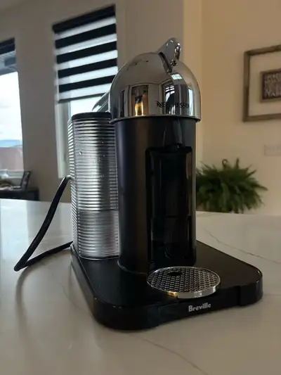 This pre-owned Breville Nespresso coffee machine is ready to brew your perfect cup of coffee or espr...