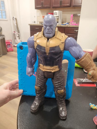 Thanos marvel figurine.arms and legs move. Smokefree,  petfree h