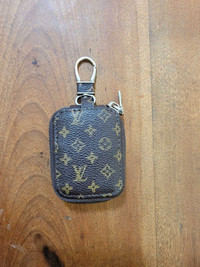 Louis Vuitton ear phone case holder