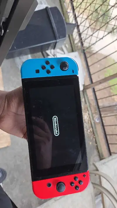 nintendo switch+ 3 games + case, View more