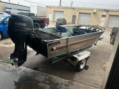 16 ft boat 2003 Yamaha 50 4 stroke motor 20’ long shaft The motor was just serviced last year before...