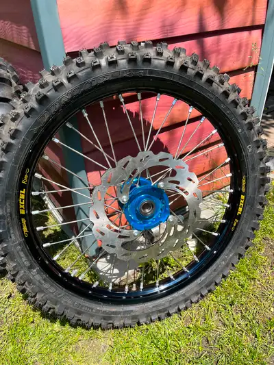 Front wheel is brand new excel rim & Tusk hub and tusk spokes with front disc Rear is off a 2023 450...