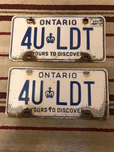 Pair of vintage Ontario vanity automobile license plates., View more