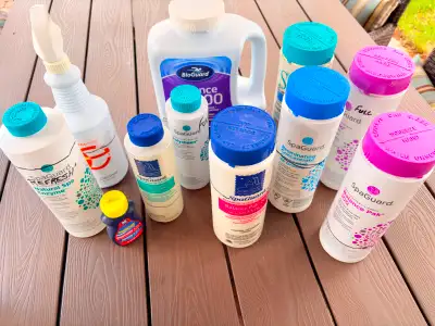 Assortment of hot tub chemicals. No longer required because we got rid of our hot tub. Some bottles...