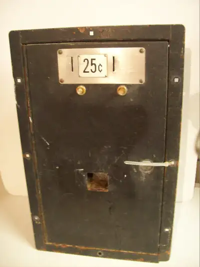 Metal coin door. Approximately 10X16.5inches Has coin return buttons, coin box and mechanisms. Will...