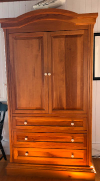 Solid pine armoire in mint condition. Approximately 25 years old