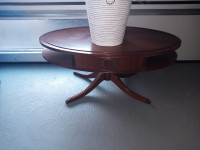 Antique oval teak coffee table