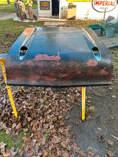 1957 Chevy hood. Came off V8 car has a few dents as shown in pictures. Come with hood latch. Overall...