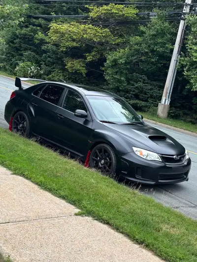 2012 Subaru WRX STI 6-speed manual Engine rebuilt Lots of mods see picture for list Full vinyl wrap...