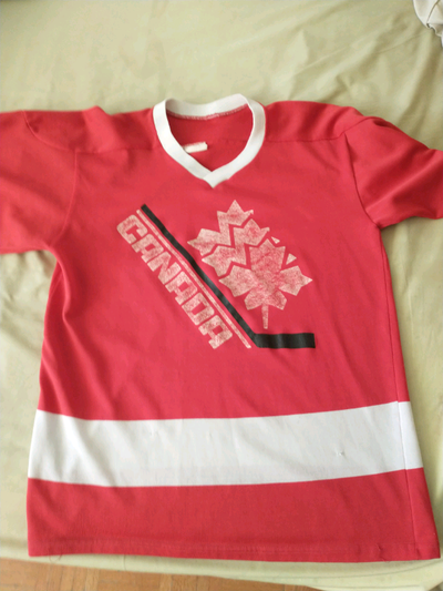 Team Canada World Juniors (red, three Leafs on stick) jersey, View more
