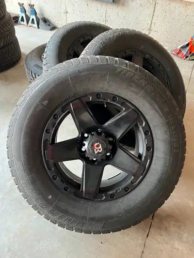 Selling a set of winter tires mounted on alloy rims, only used for ONE season – tons of tread left,...