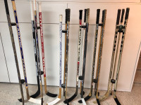 Hockey stick coat racks