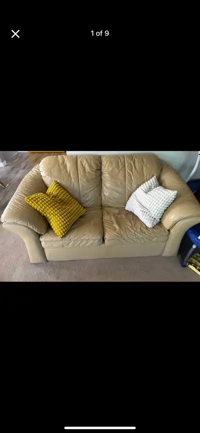 Free leather couch and love seat. Pick up in McKenzie lake.