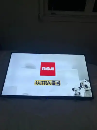 43 Inch RCA TV with remote Inputs include: - HDMI x 4 - USB - RF - other (see images) 2 small marks...