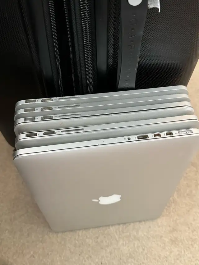 12 top cases with logic boards MacBook Pro models A1502 in Laptops in Edmonton - Image 10