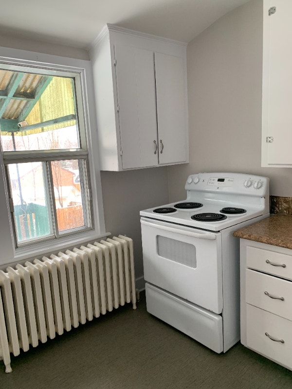 Clean centrally located upstairs 2 bedroom apt for rent, June 1 Long