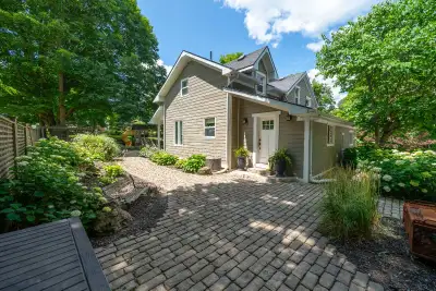 Beyond its classic white-picket-fence appeal, this exceptional residence offers a rare combination o...