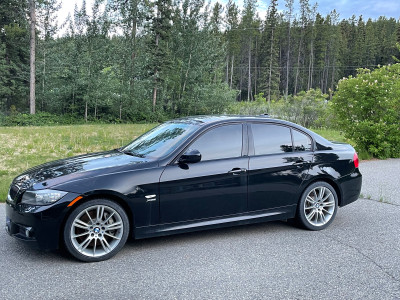 2010 BMW 335i xDrive (rare) with M package.