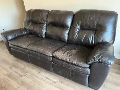 Free Leather La-z-boy reclining couch. No rips or tears, still very comfortable. Reclines at both en...