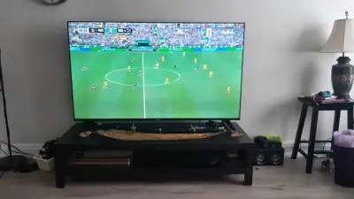 RCA 65-inch Ultra HD Smart /TV stand / speaker, View more