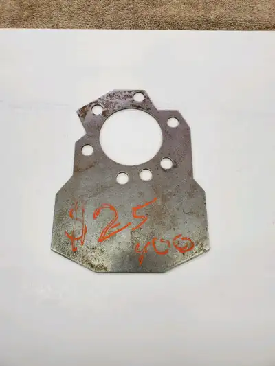 Hi. This is a balancing plate that is used to put at 350 flywheel on a 400 small block Chevy.