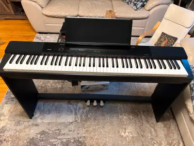 Casio Privia PX-150 in good shape. 13 Years old. Comes with bench, stand and integrated pedals. Aski...