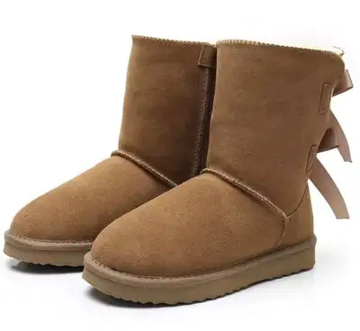 Genuine Leather size 6.5 Ugg like boots with bow , View more