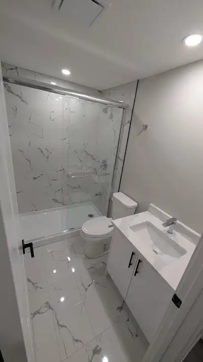 This newly built unit offers a spacious living area, two comfortable bedrooms, a modern bathroom, an...