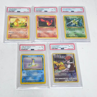 PSA graded Pokémon cards charmander Pikachu lapras scyther 