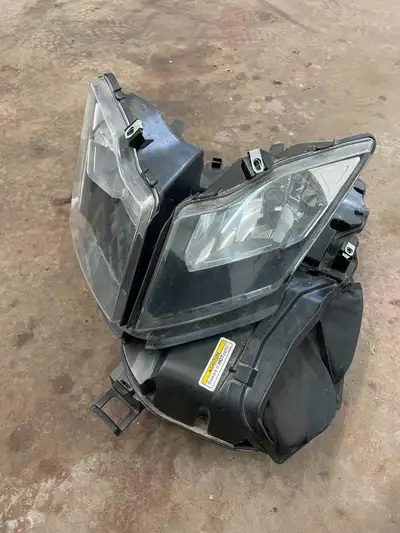 Ski doo rev xp front head light assembly, with air box