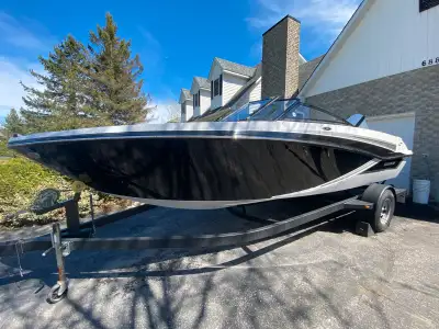20 ft Glastron with 225 Etec HO. Top speed around 60 mph. Transferable warranty on engine until June...