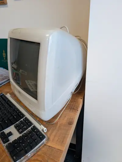 Apple vintage computer and keypad. Iconic apple computer.