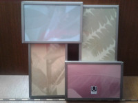 Umbra - multi   picture photo  frame (brand new)