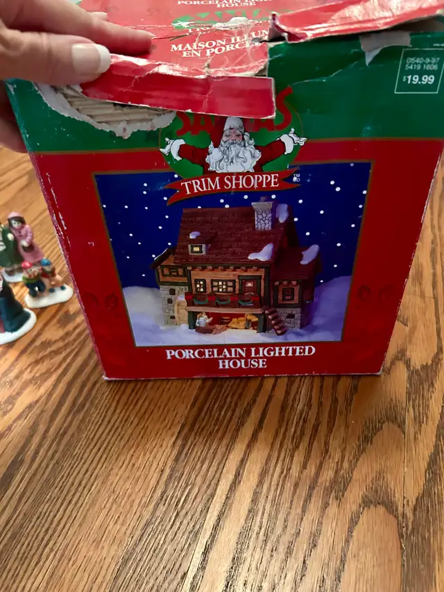 Porcelain lighted Christmas house.571057960052346881